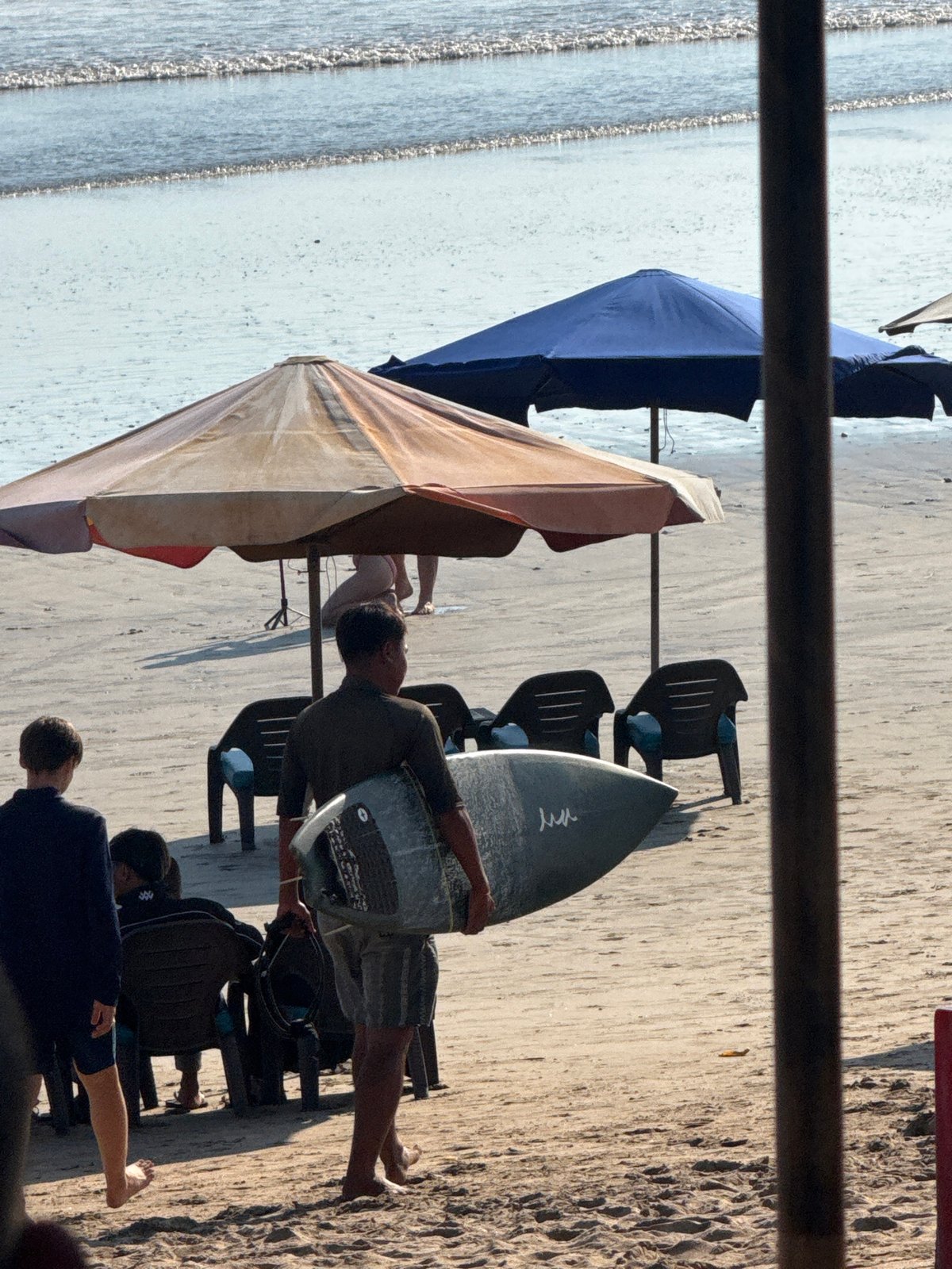 A day at Kuta Beach, from surf lessons to sunset