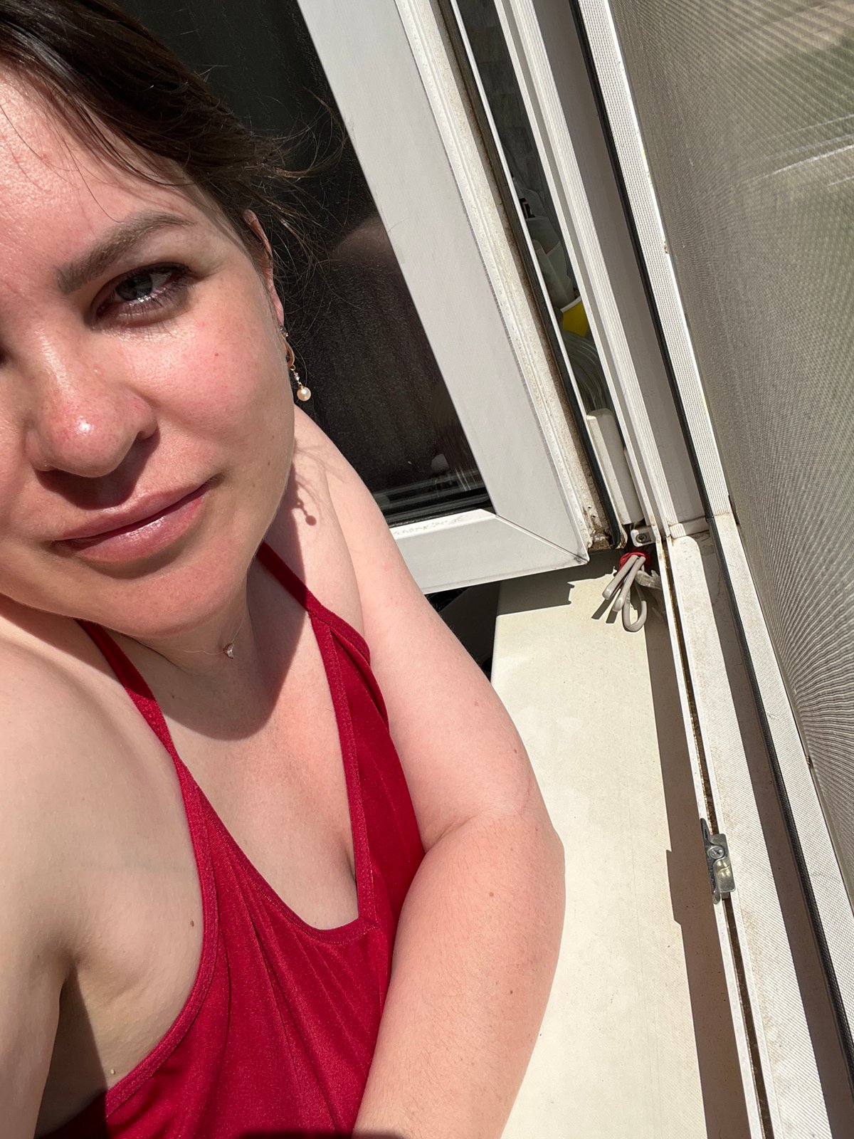 Lazy summer morning at home with a cat and company