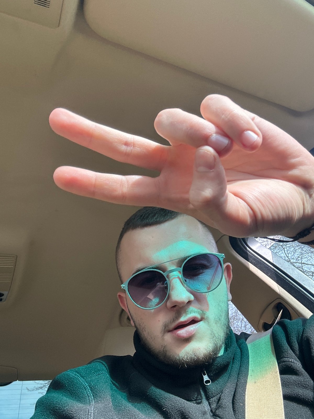 Man takes selfies in car in Plovdiv, Bulgaria