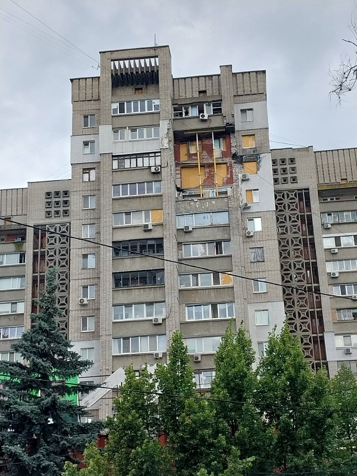 Dnipro street-level scenes mix daily life with shelling damage