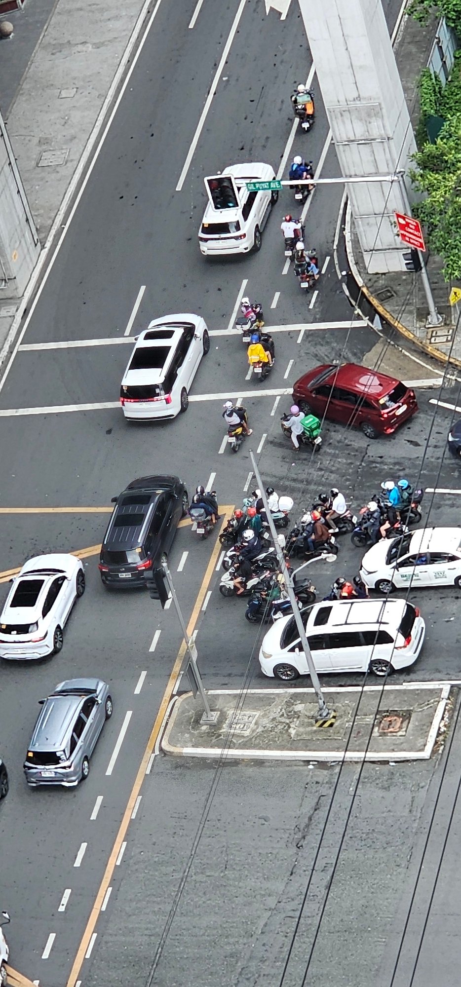 Morning traffic and street activity across Makati City