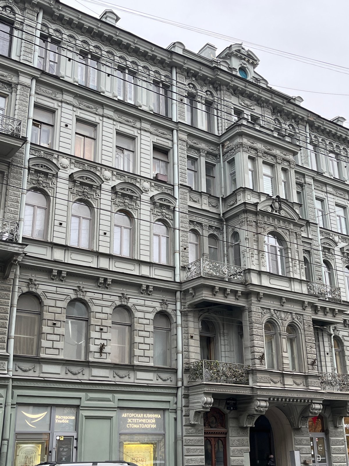 Urban walking tour documents historic district under overcast skies