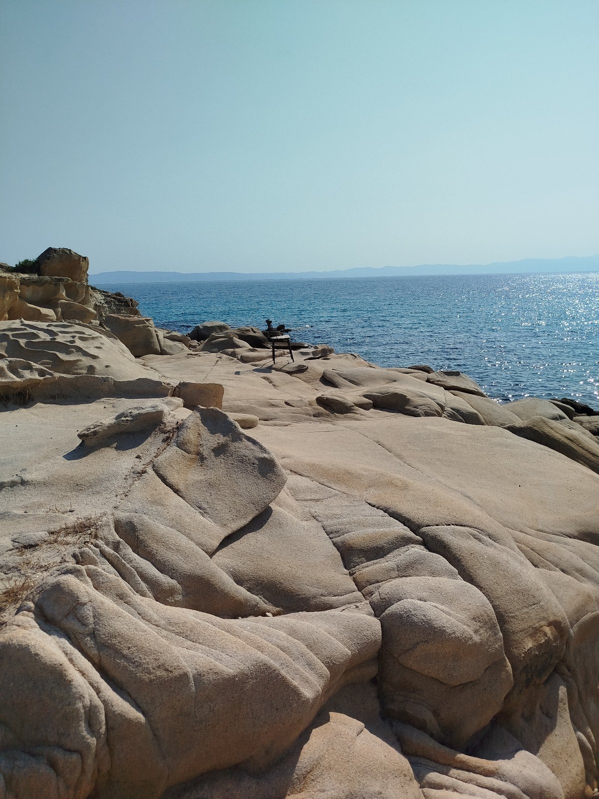 Sunny morning on a rocky Sithonia beach, Halkidiki