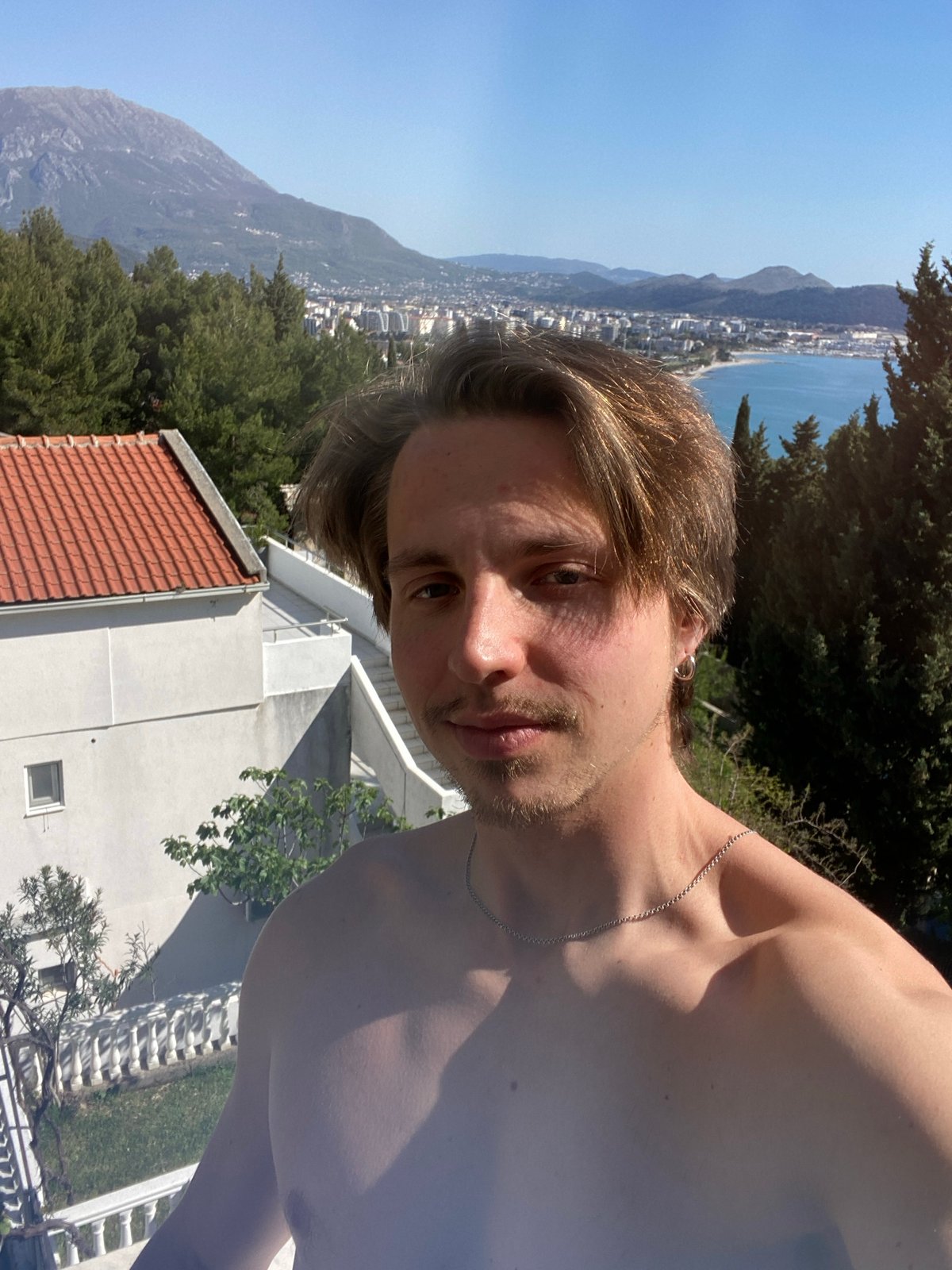 Tourist documents scenic views and moments in Šušanj, Montenegro