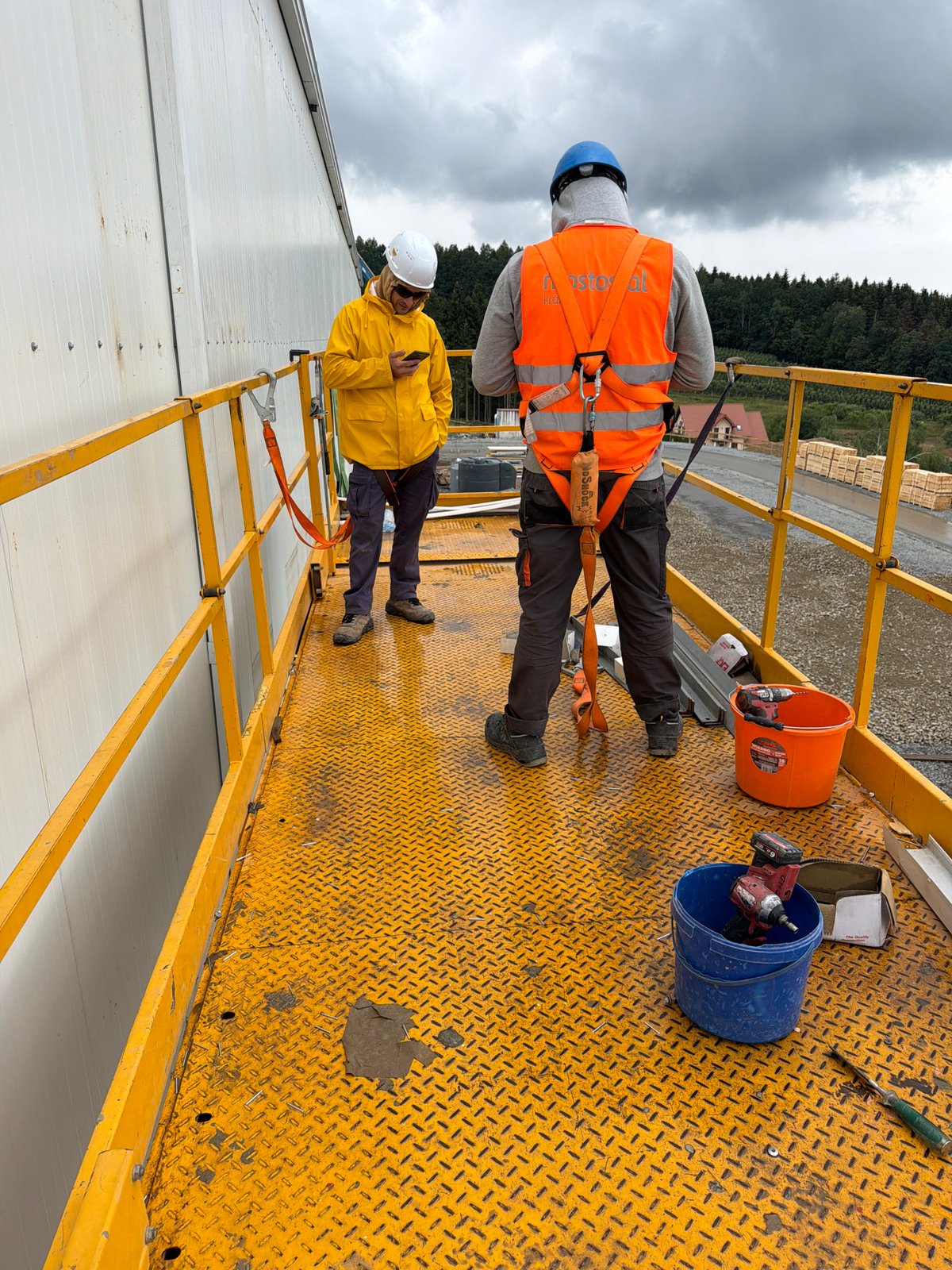 Construction crew at work on a Stróża industrial site