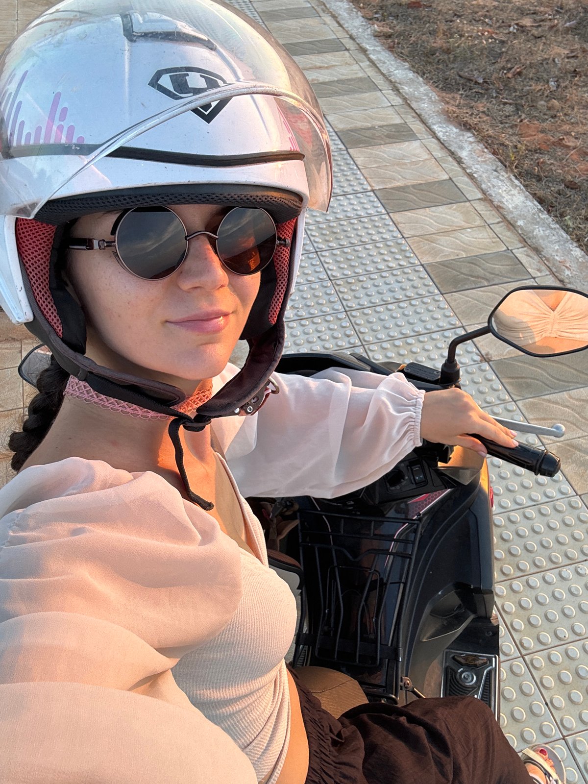 Woman photographed on scooter in Mũi Né, Vietnam