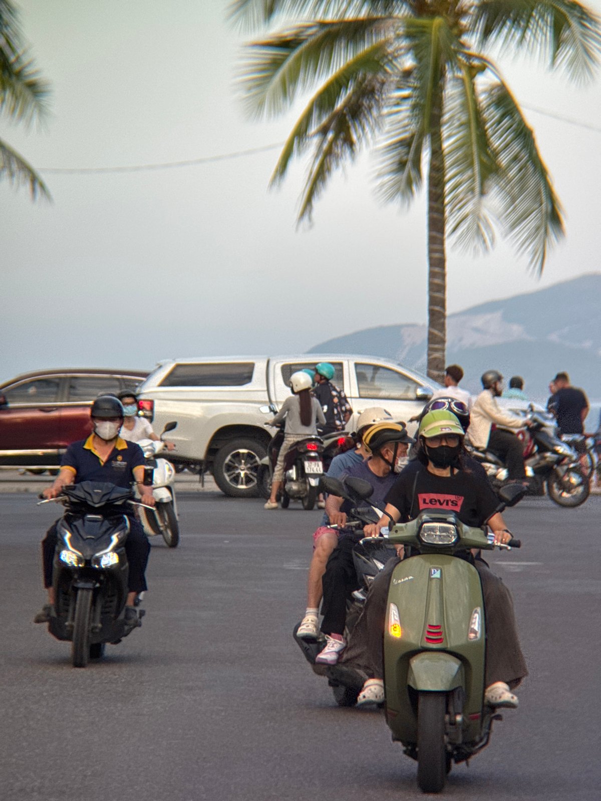 Nha Trang street and park life on a grey morning