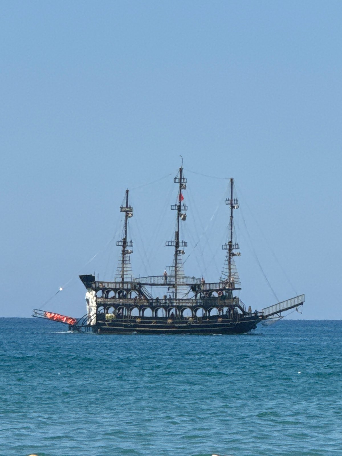 Pirate ships, parasailing, and yachts off Manavgat coast