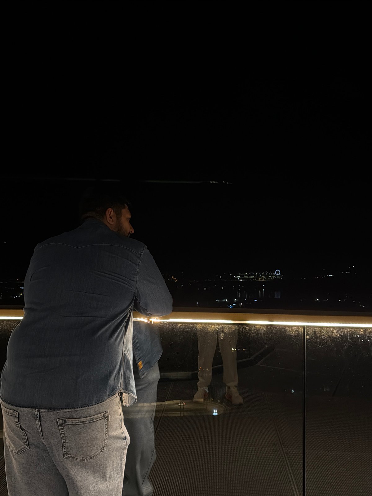 Night observation at Krasnoyarsk viewpoint with illuminated Russian flag