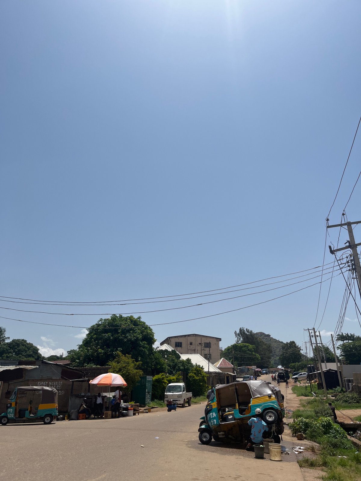 Midday street life and market activity across Gwong and Jos, Nigeria