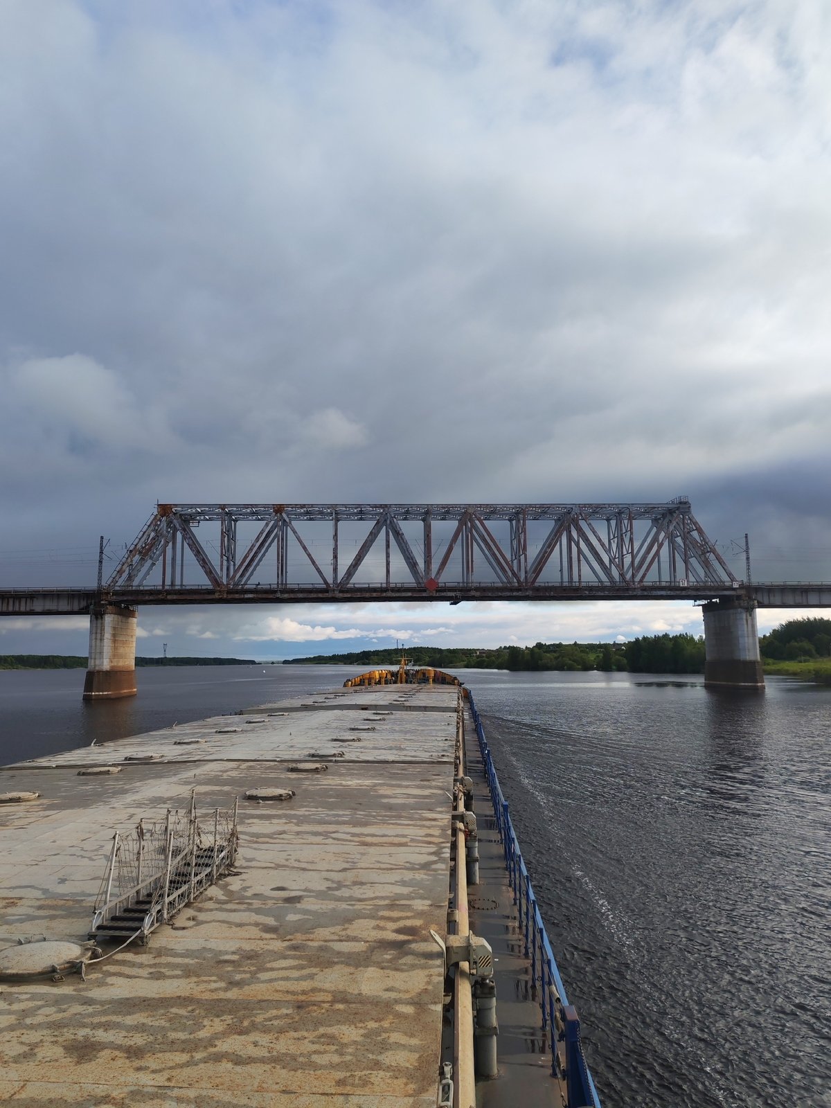 Russian cargo vessel navigates waterways near Tarkanovo bridge