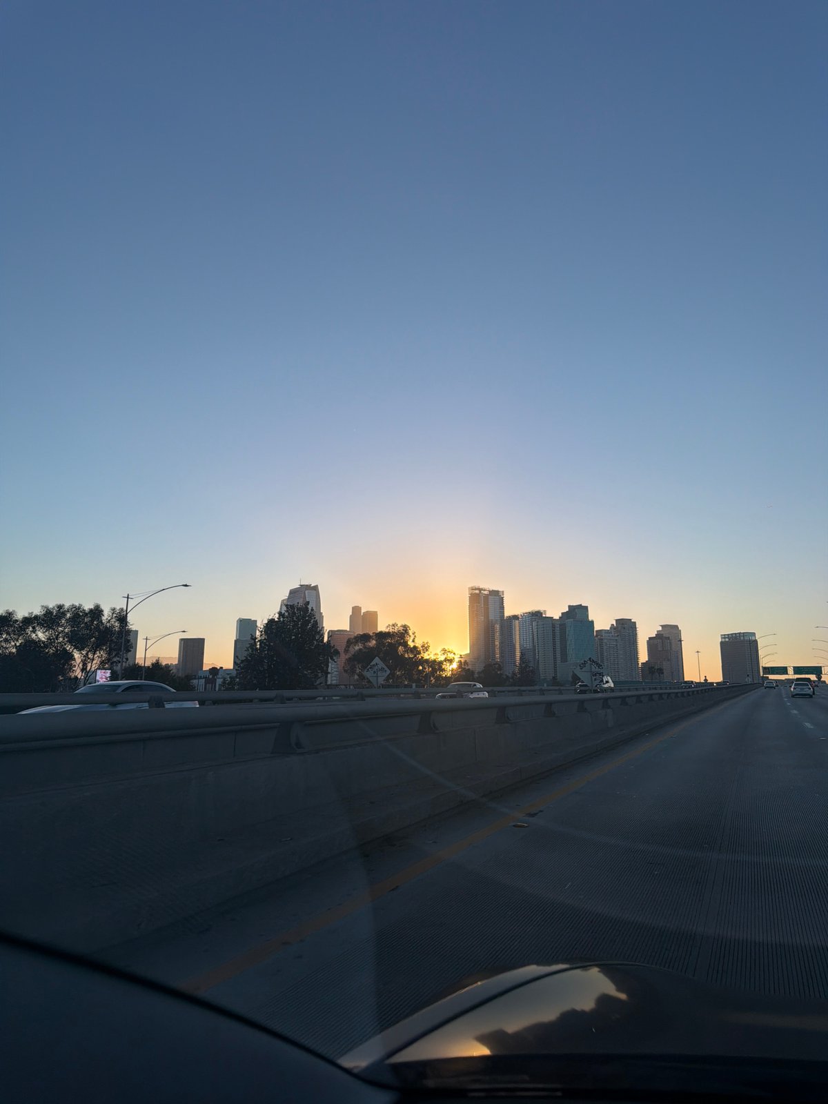 LA skyline from the highway at golden hour