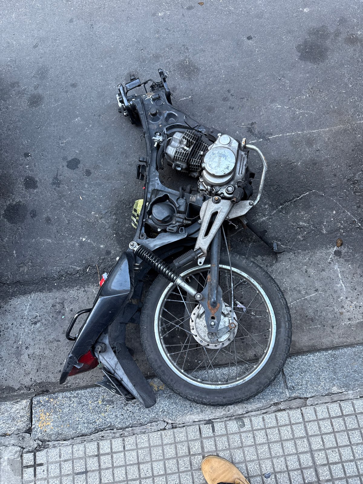 Stripped motorcycle frame, decorated car spotted on Buenos Aires street