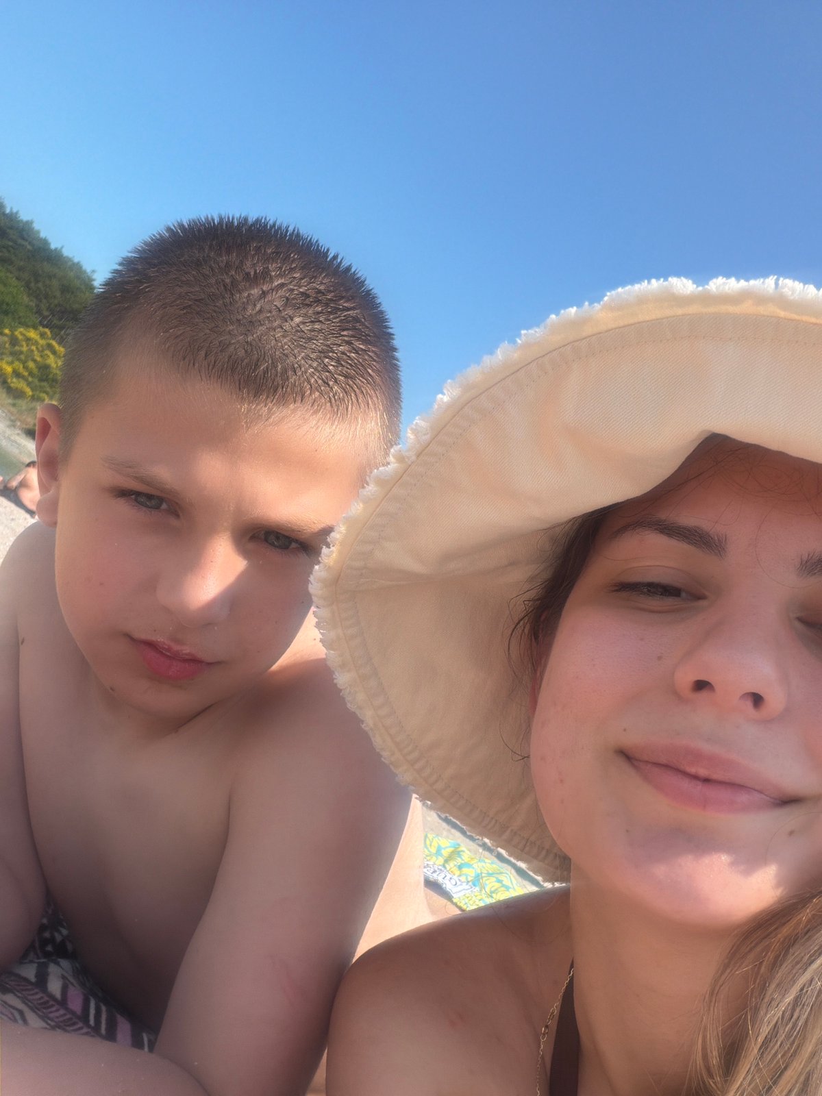 Couple takes beach selfies during sunny afternoon in Tsarevo