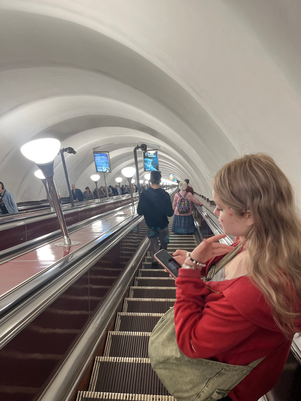 Ordinary pedestrian activity observed across Saint Petersburg metro, streets