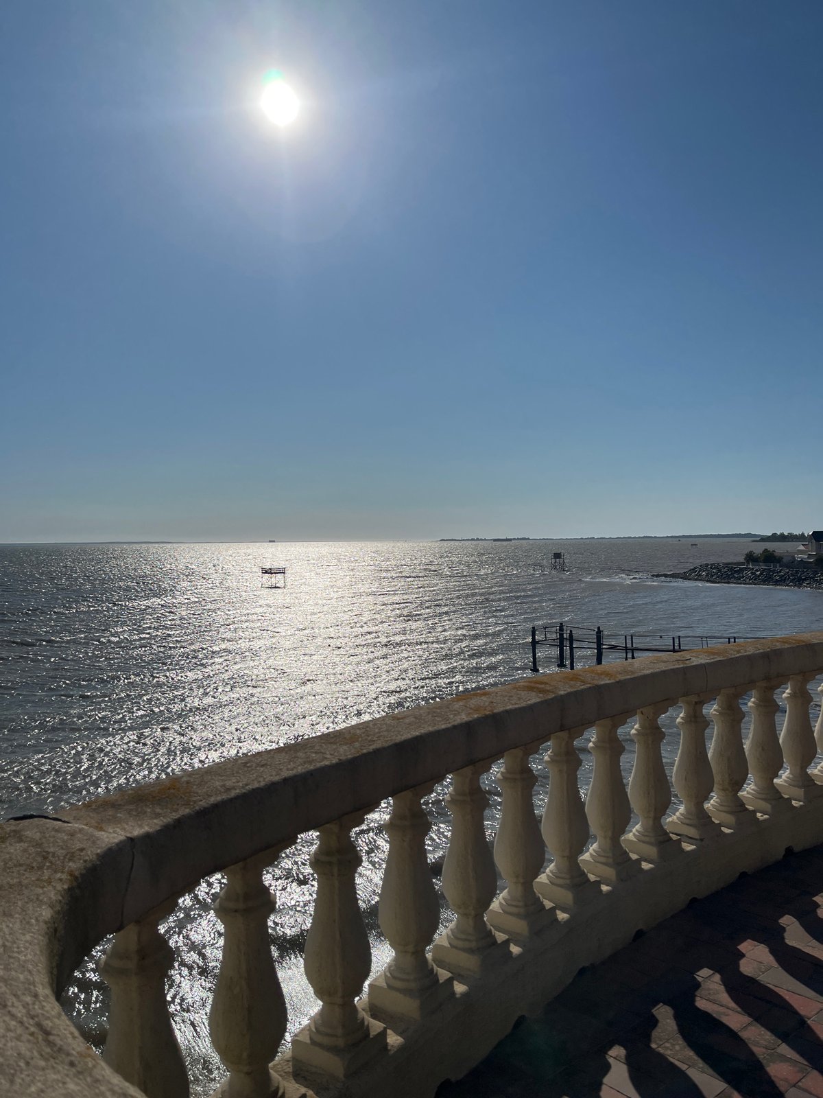 Coastal views from Fouras, France — balconies, beach, and a carrelet