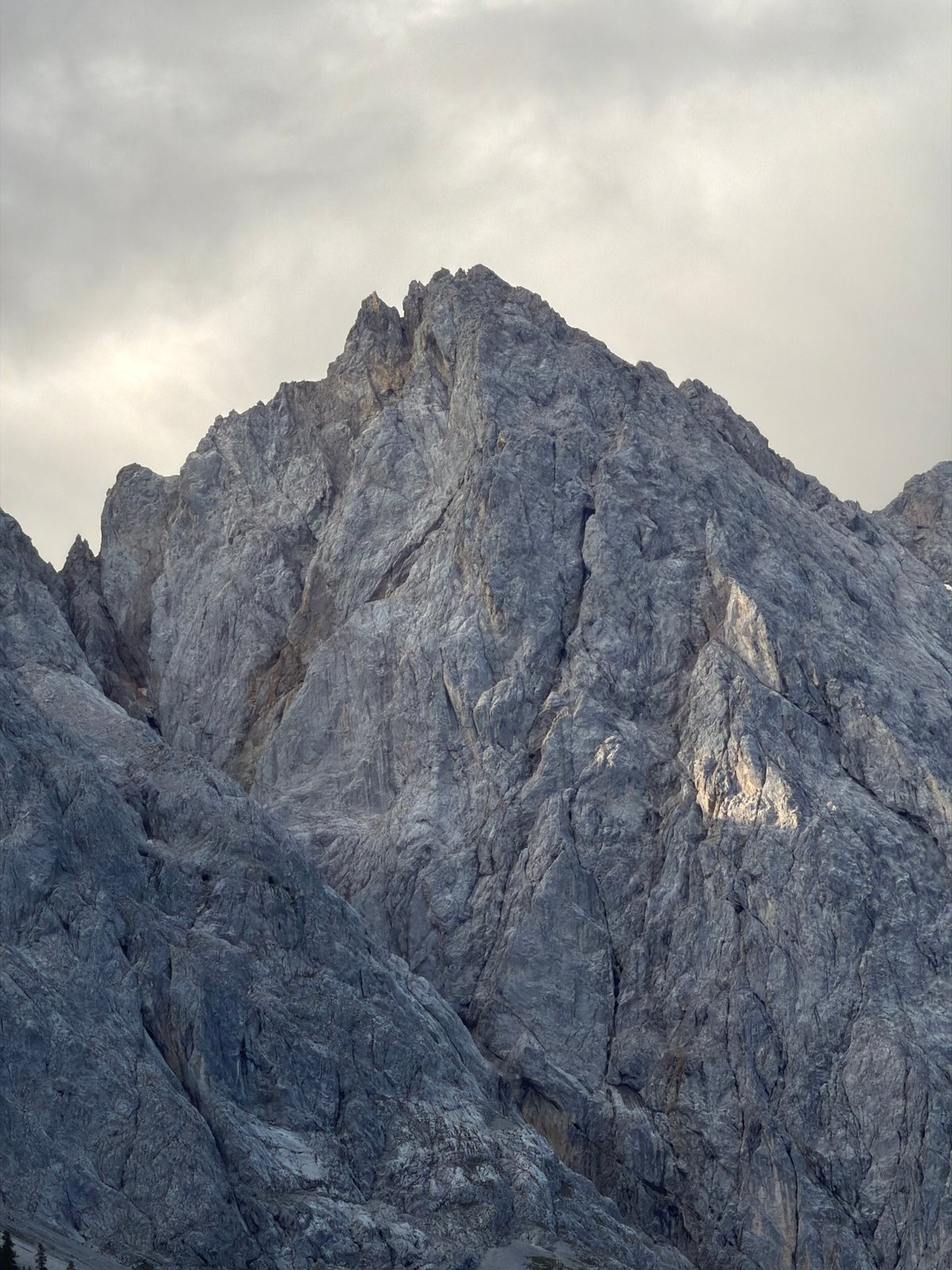 Zugspitze rock face and cable car tower, Grainau