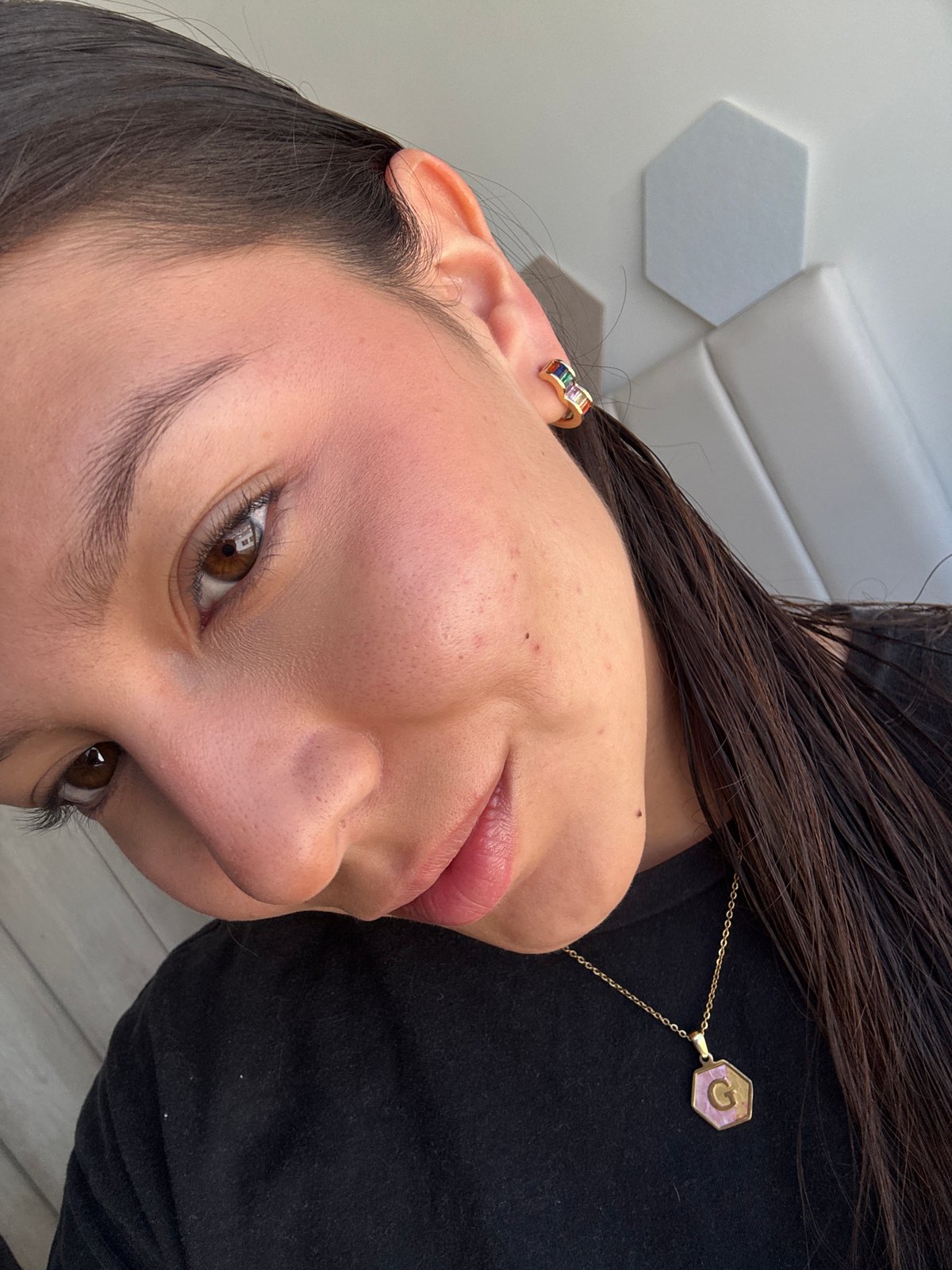 Woman photographs herself in San Francisco Ocotlán, Mexico