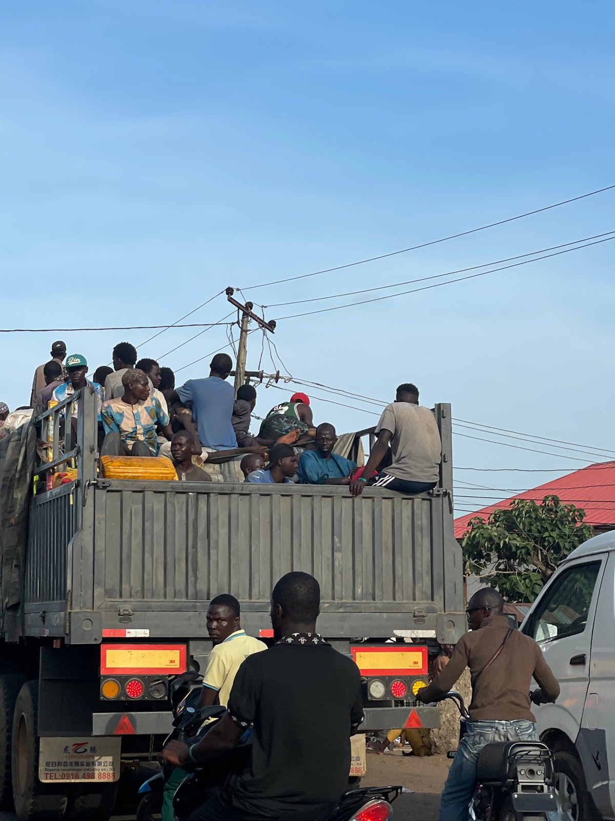 Everyday street life documented in Lokoja, Nigeria afternoon