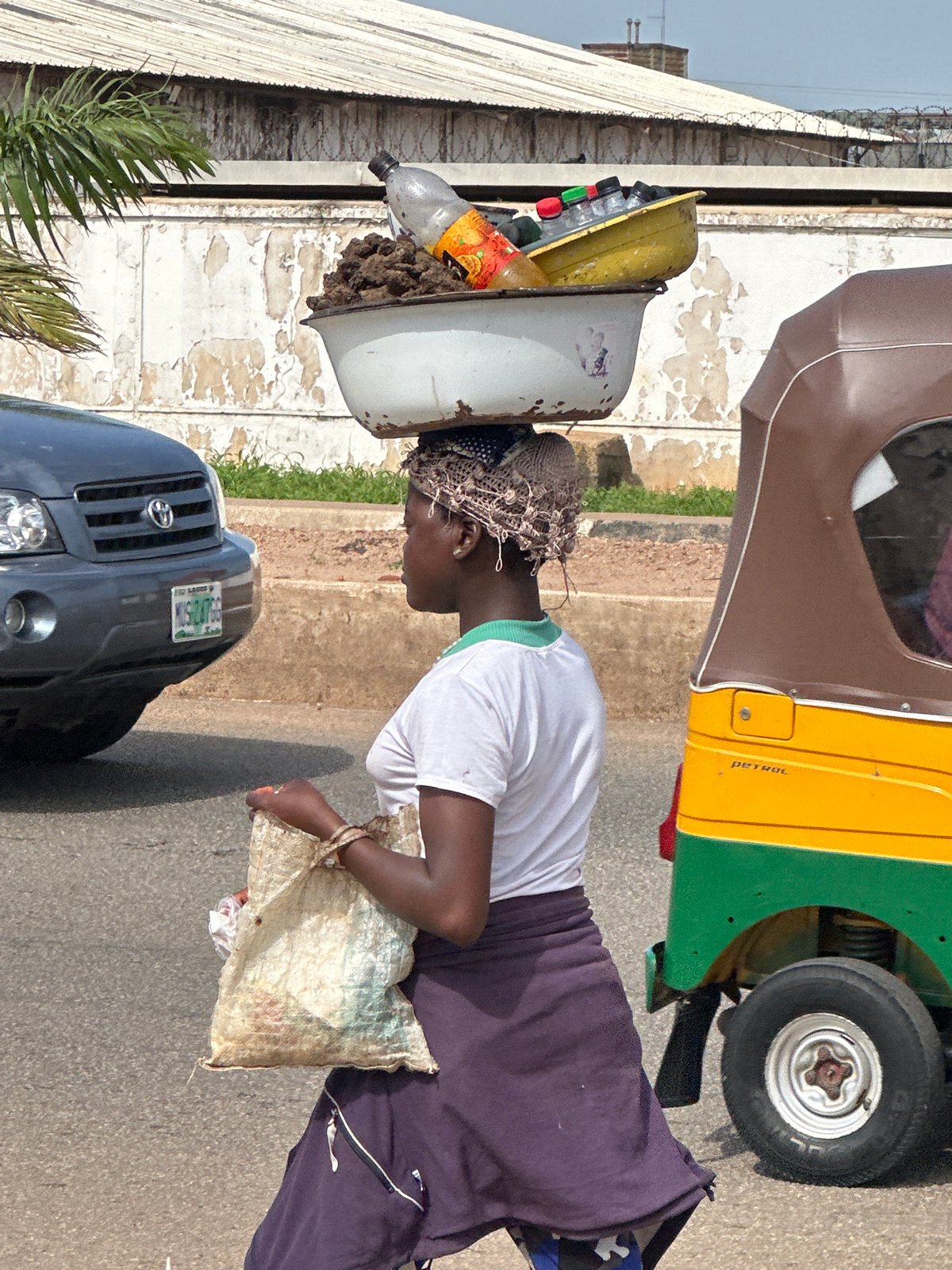 Afternoon street life and work across two Nigerian towns