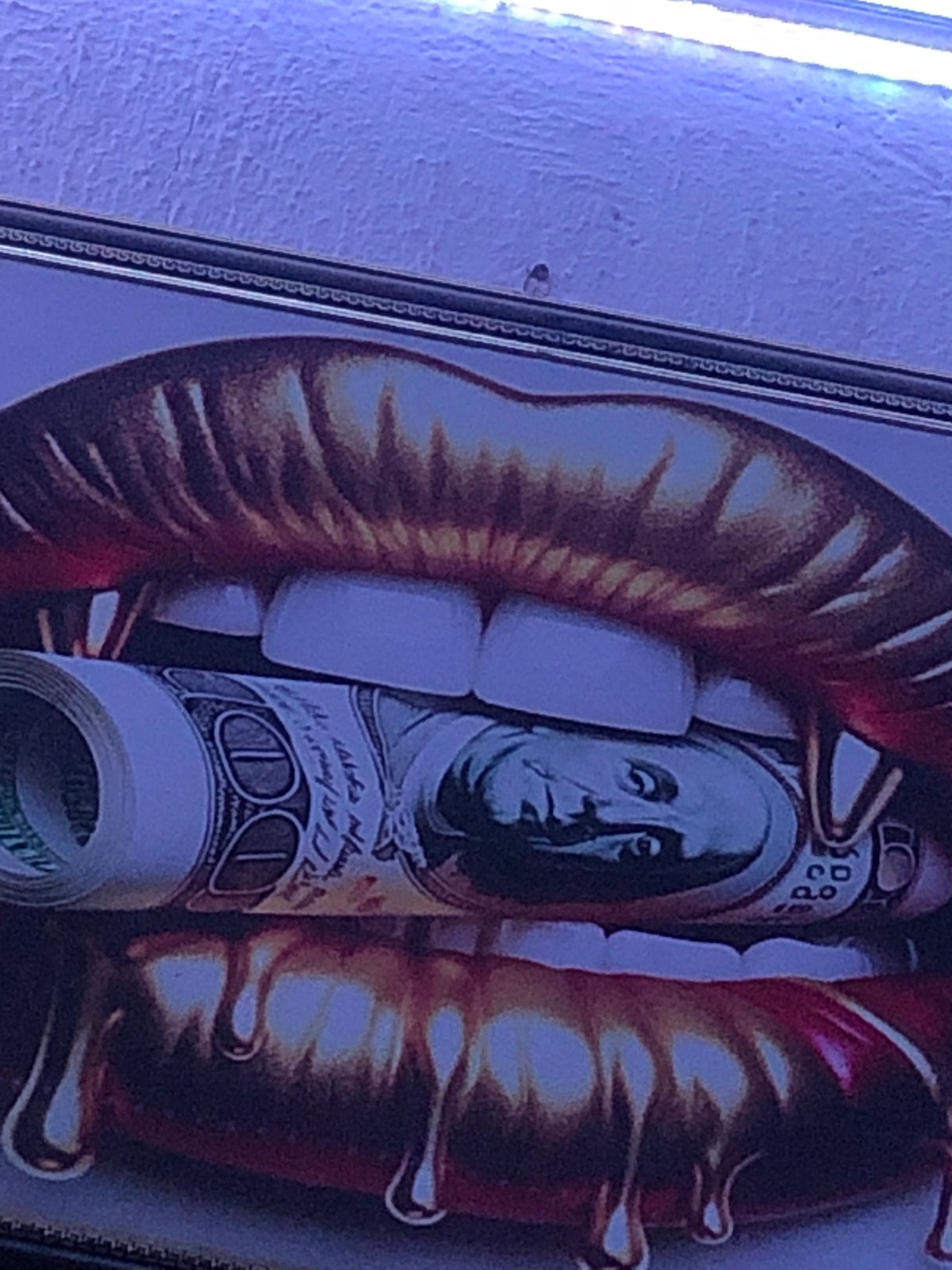 Close-up shots of artwork, marble surface, liqueur packet