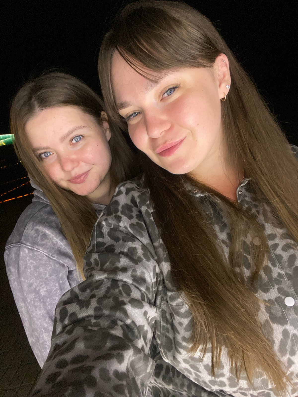 Night out in Votkinsk beside a lit-up harp sculpture