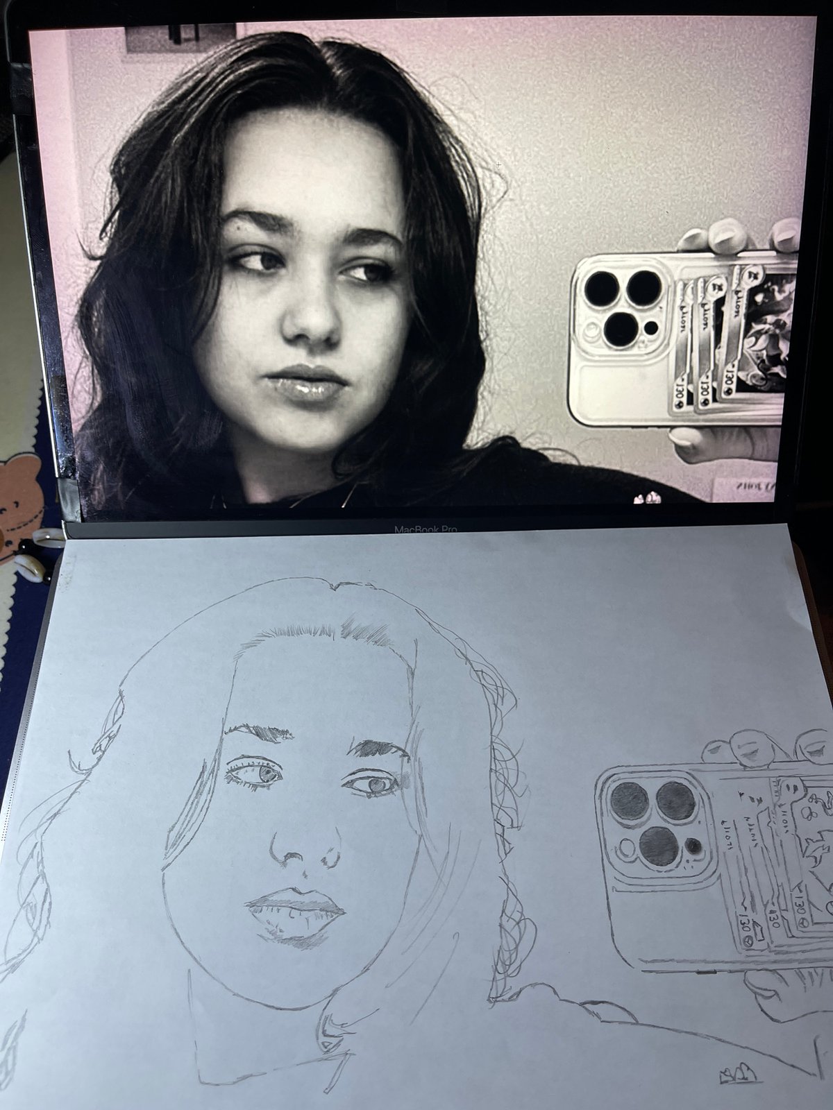 Photo-sketch comparison observed on laptop screen in Jos, Nigeria