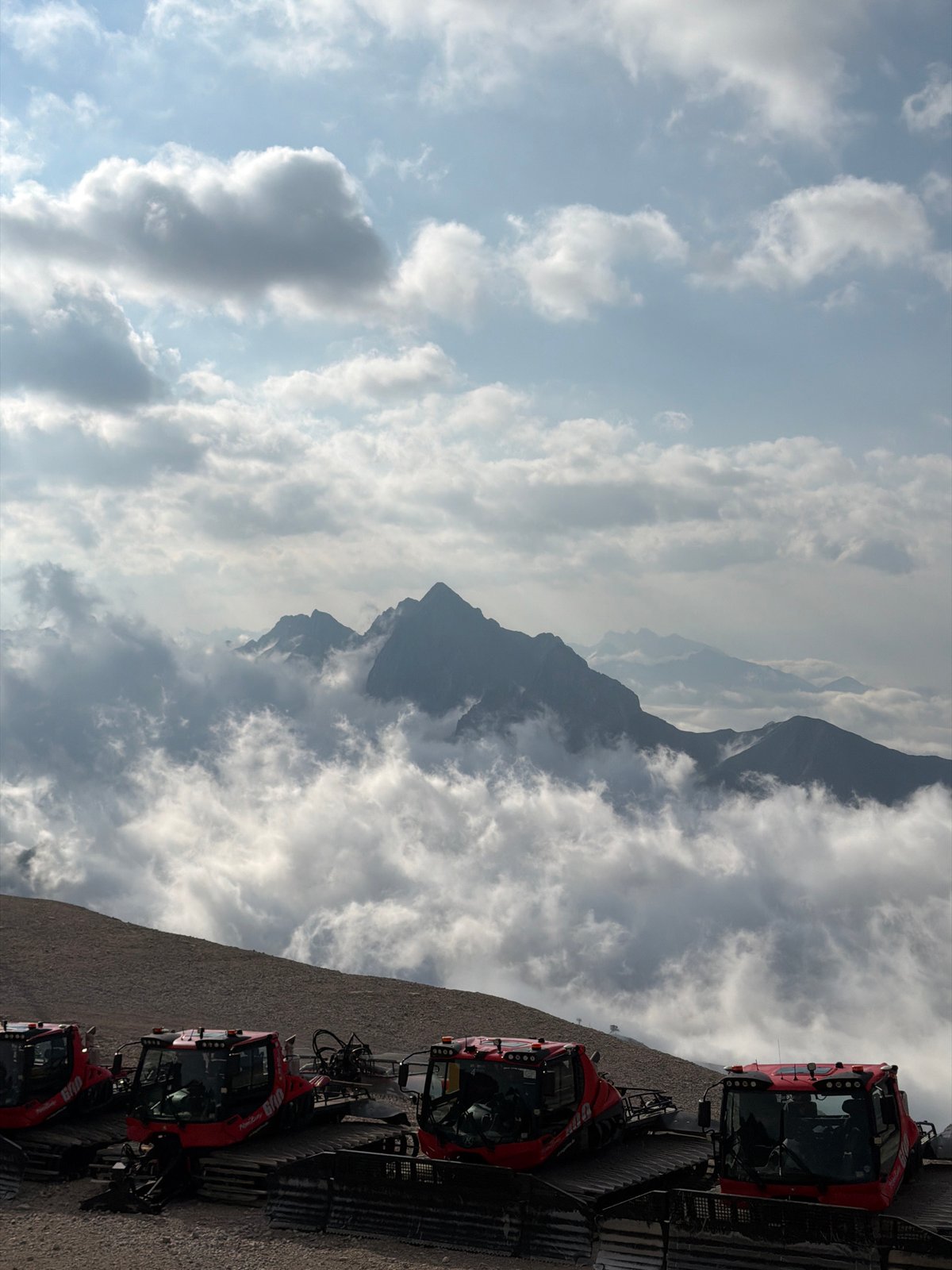 Early morning at Zugspitze with cable cars and snow equipment