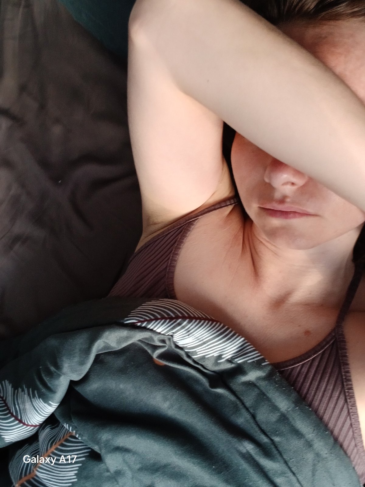 Woman resting in Yekaterinburg apartment during early morning hours