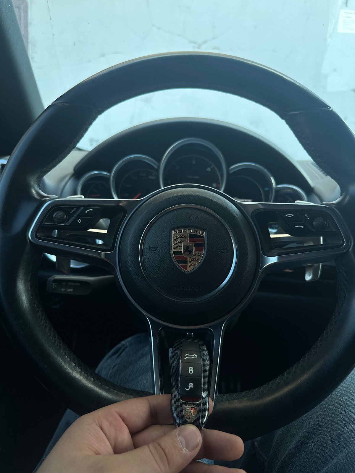Driver holds key fob in vehicle at unknown location