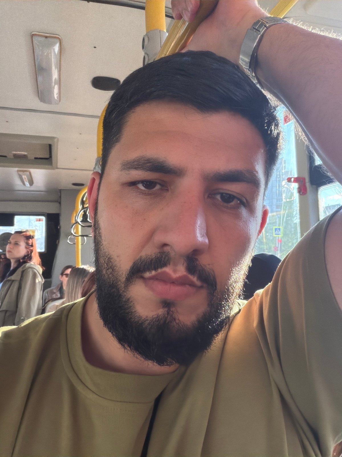 Man takes selfie on public bus in Krasnoyarsk