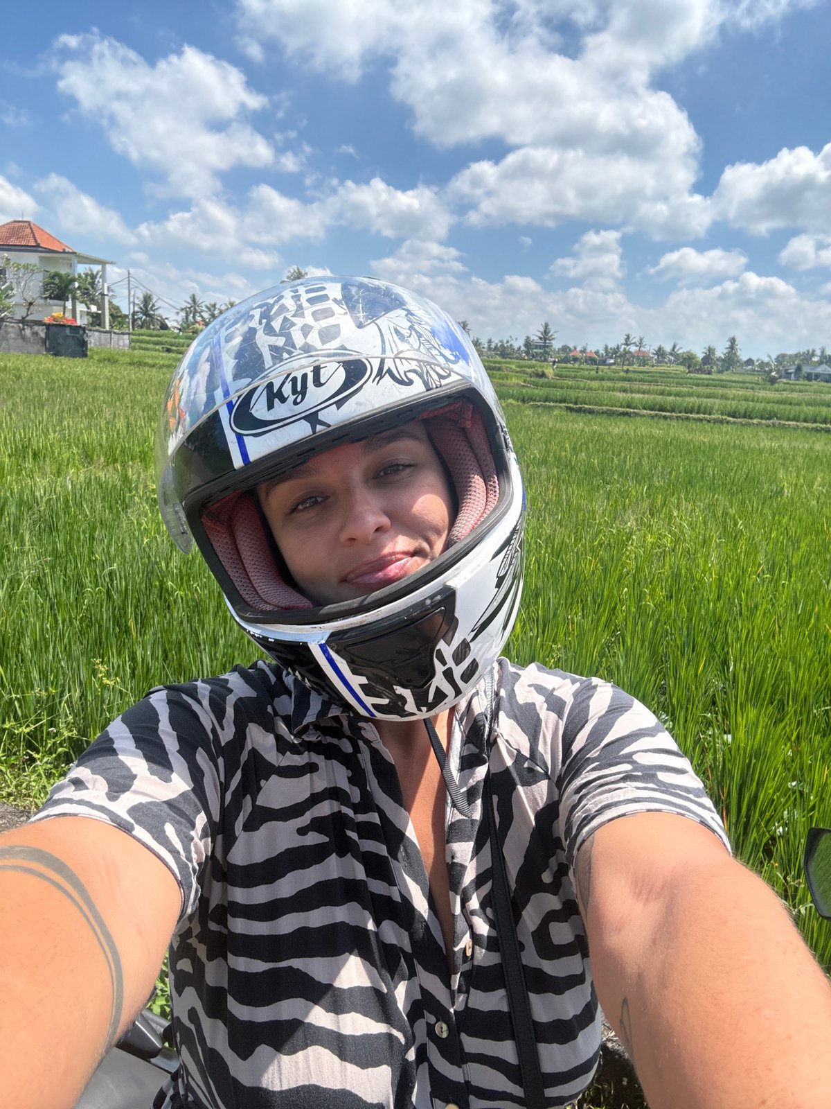 Motorcyclist documents rural journey through Indonesian rice fields