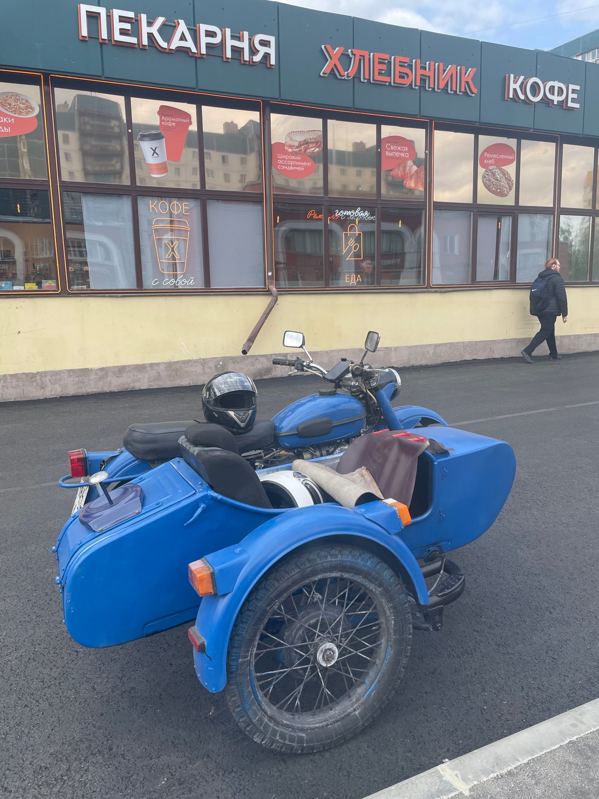 Street scenes and blue motorcycle documented in Saint Petersburg
