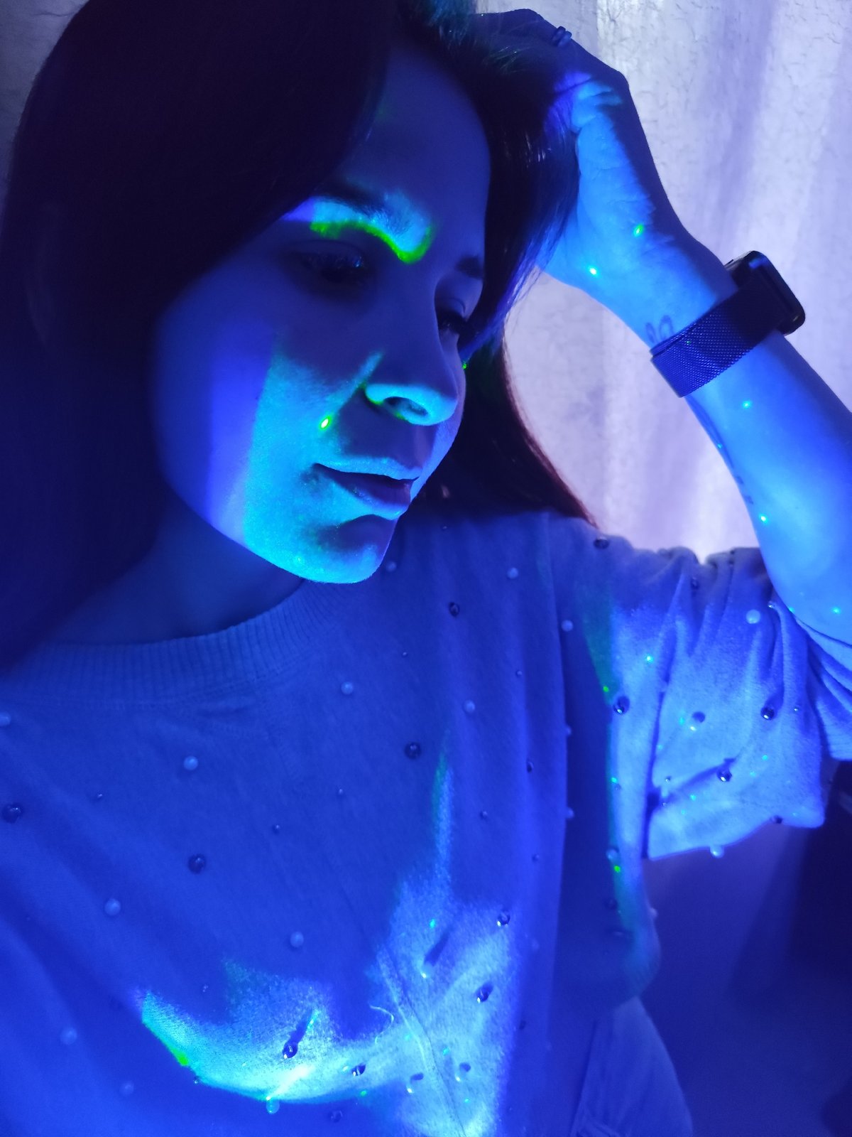 Woman observed in illuminated indoor setting in Фоки, Russia