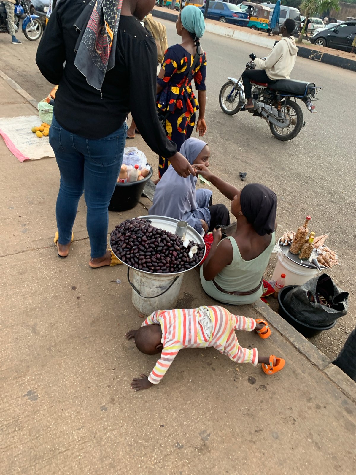 Street life and commerce across two Nigerian neighborhoods
