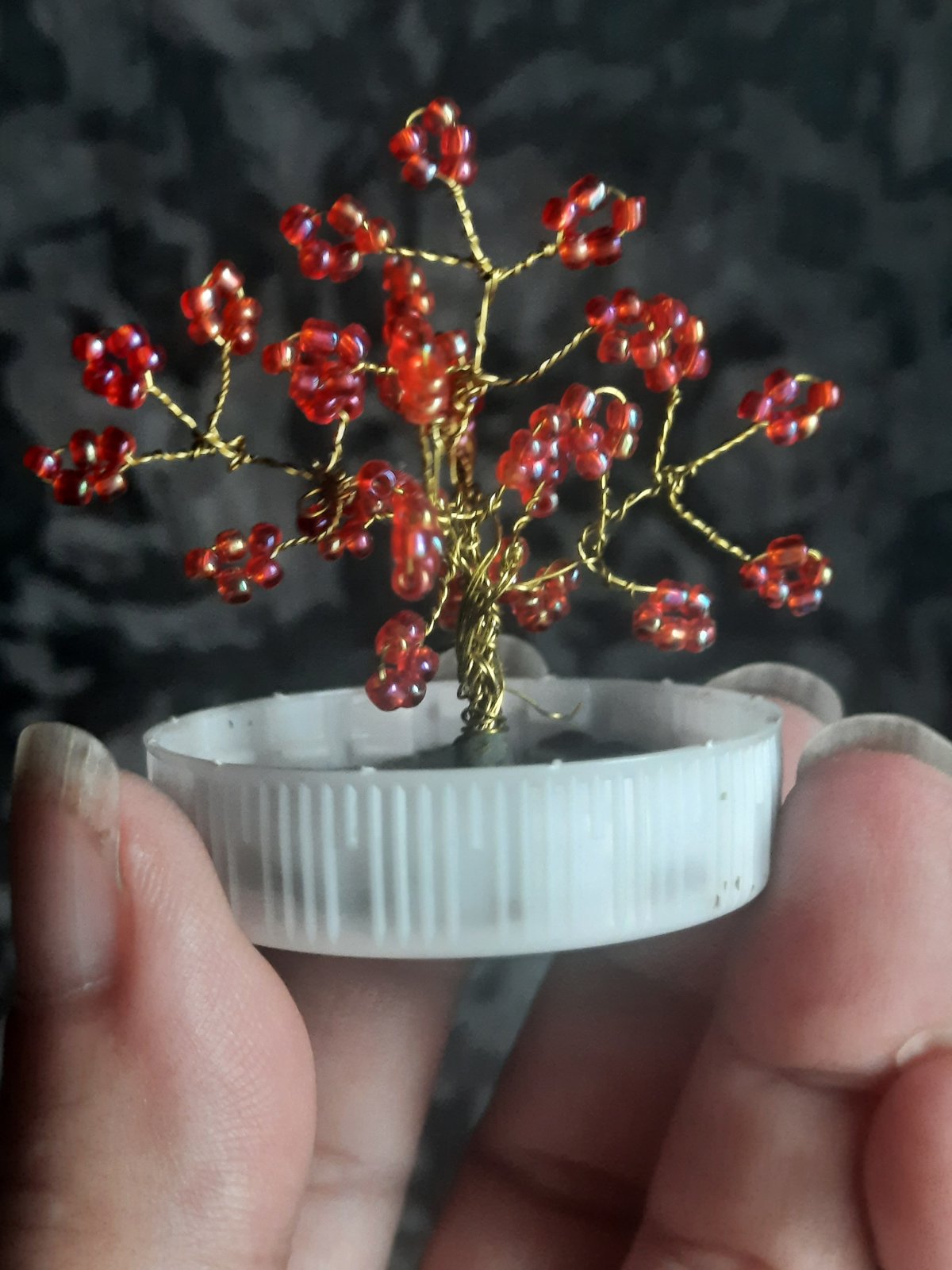 Handmade beaded tree ornament displayed in Sluck, Belarus