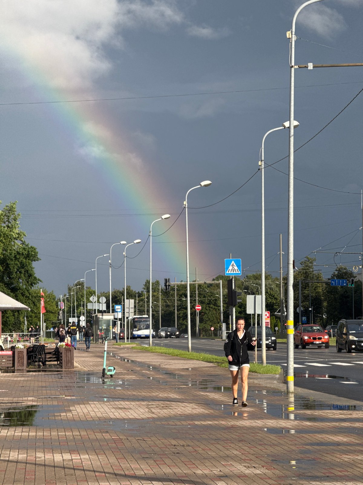 Rainbow over wet Riga streets after a summer rain