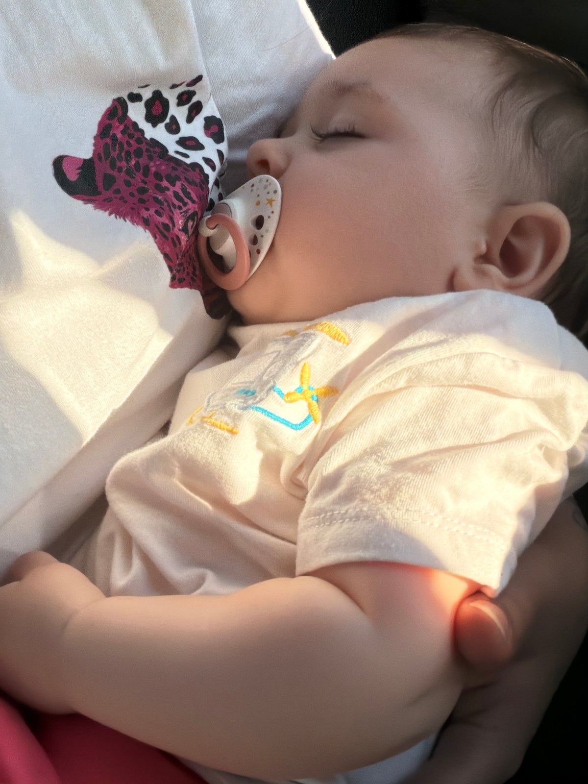 Car journey with sleeping infant documented in Lyubimets, Bulgaria