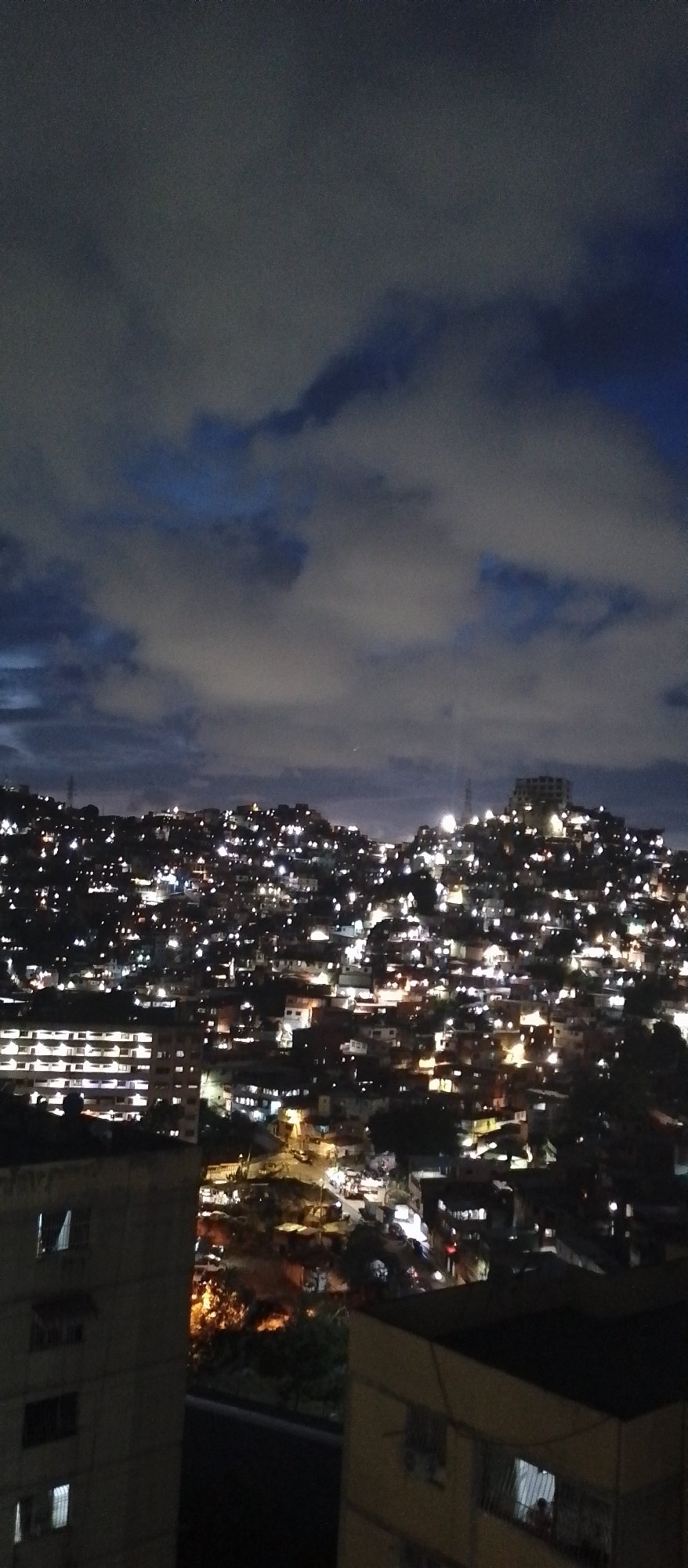 Caracas nighttime cityscapes and domestic cat scenes documented