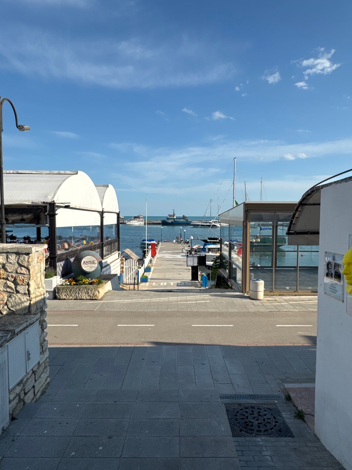 Waterfront walk through Balchik's marina and restaurant district, Bulgaria