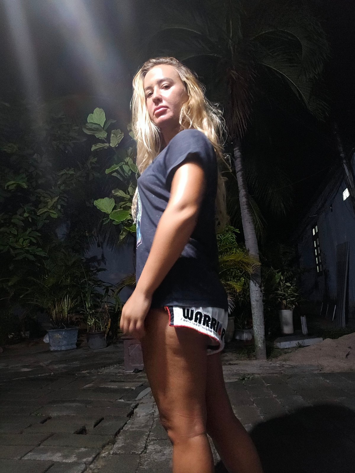 Nighttime hang in Phan Thiết, multiple angles, same outfit