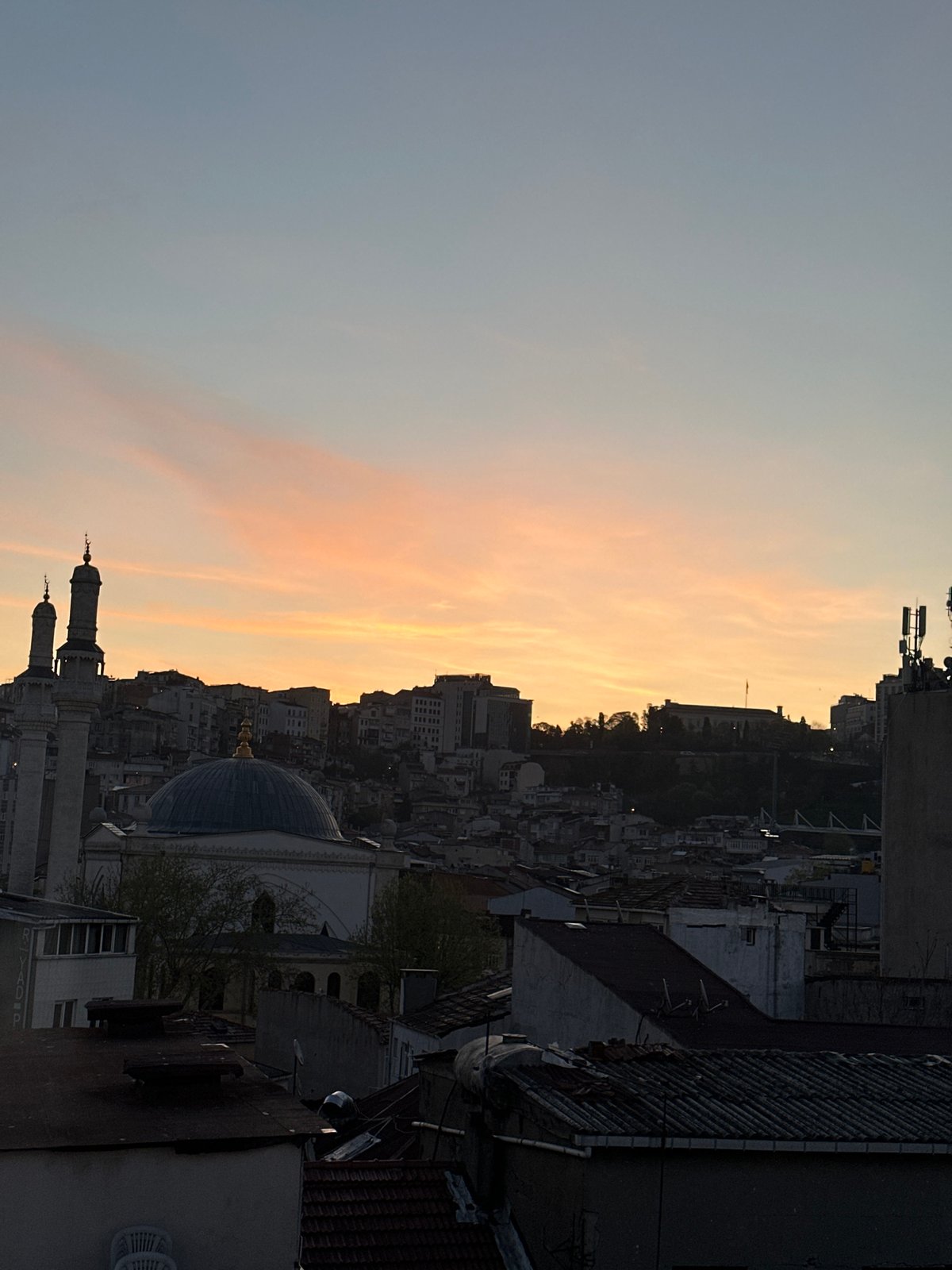 Dawn cityscape captured from Beyoğlu rooftop in Istanbul