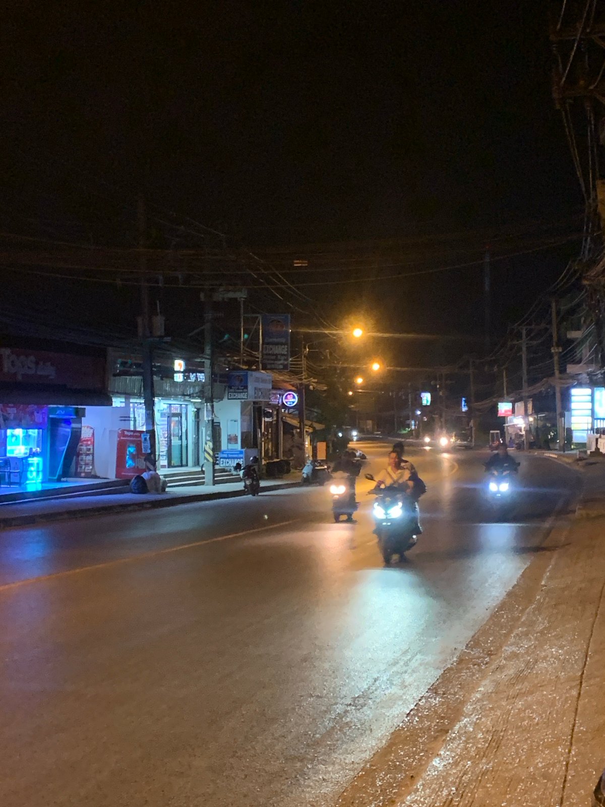 Evening motorcycle traffic recorded in บ้านบางรักษ์ street scene