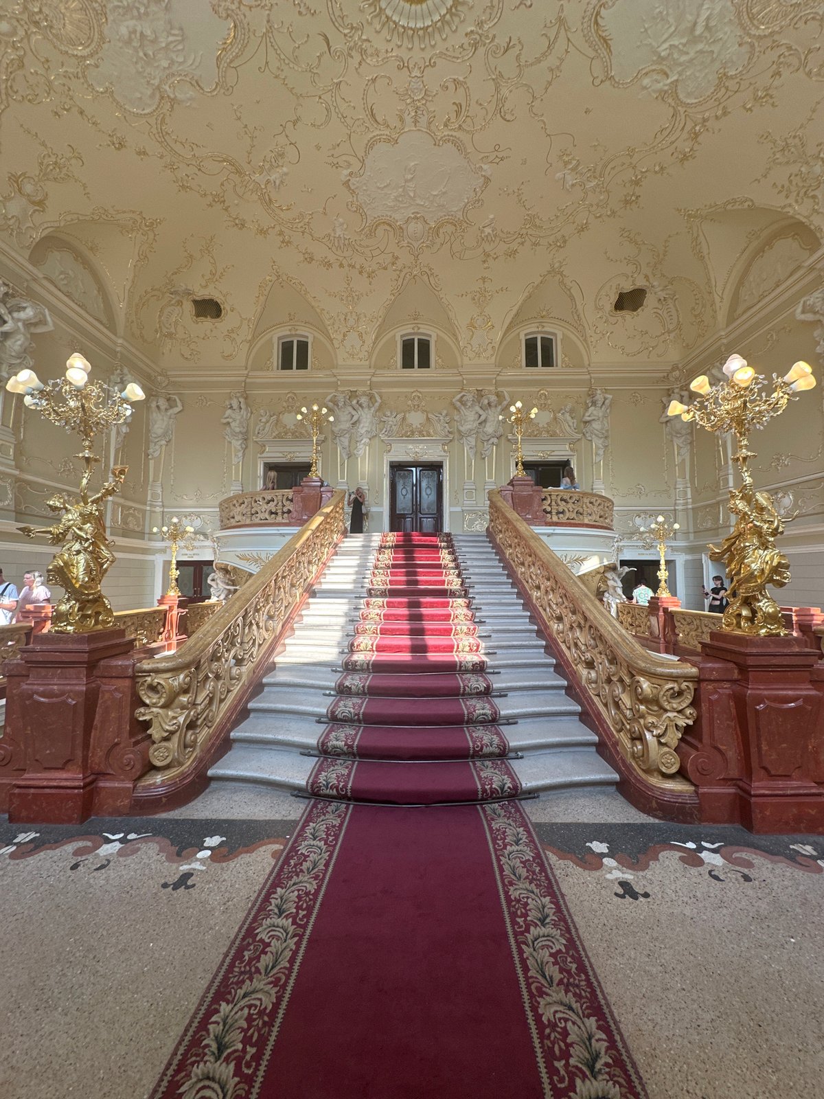 Inside Odesa's Opera and Ballet Theater, plus the surrounding promenade