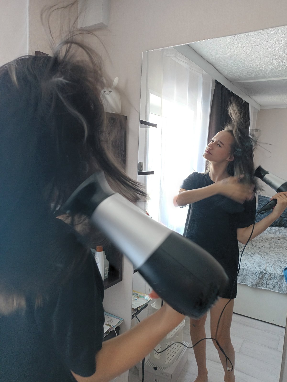 Morning hair care routine captured in Ольховка home
