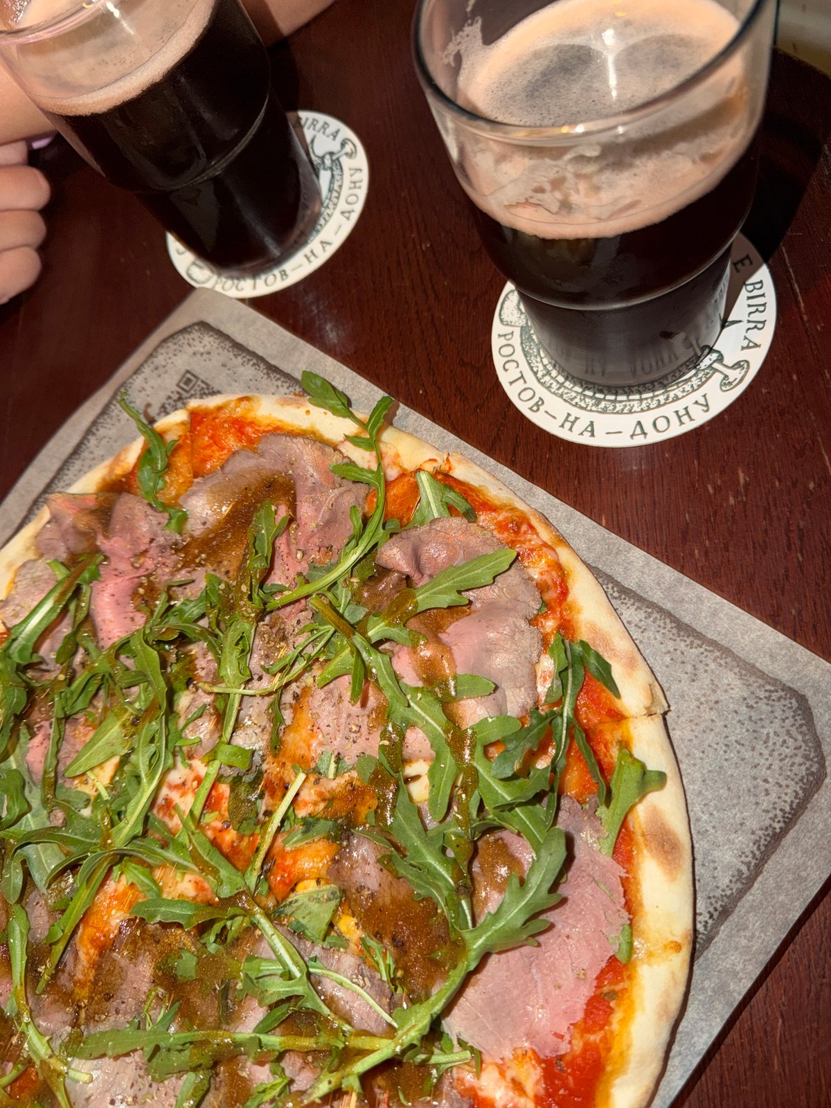 Beer and pizza documented in Rostov-on-Don dining scene