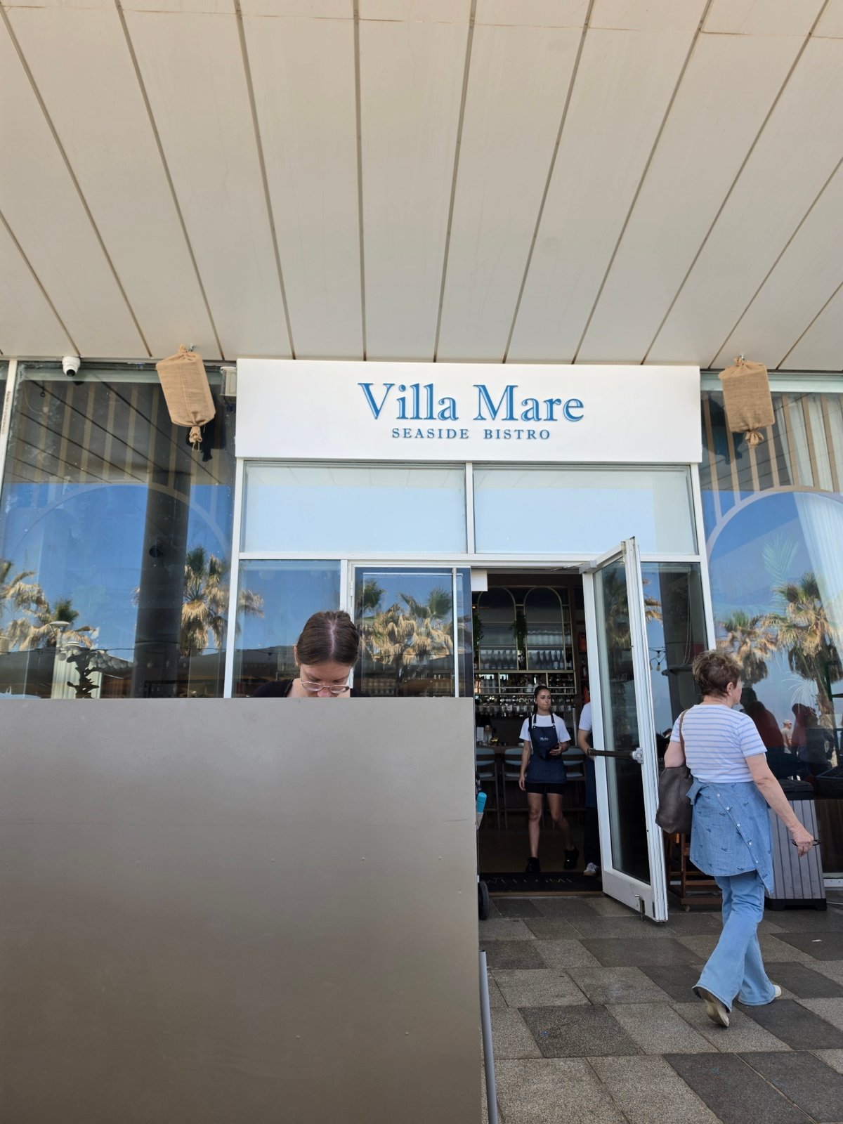 Morning dining scene at coastal Bat Yam restaurant