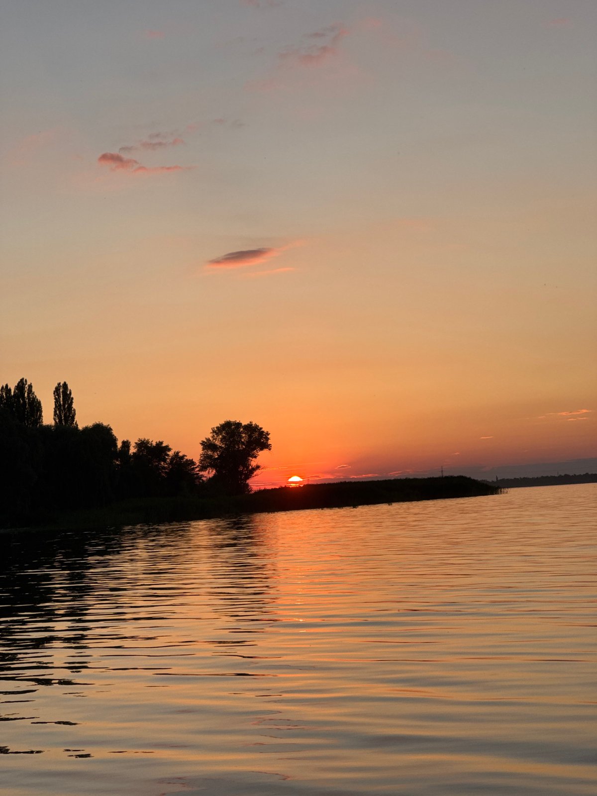 Quiet sunset colors over a Ukrainian riverside.