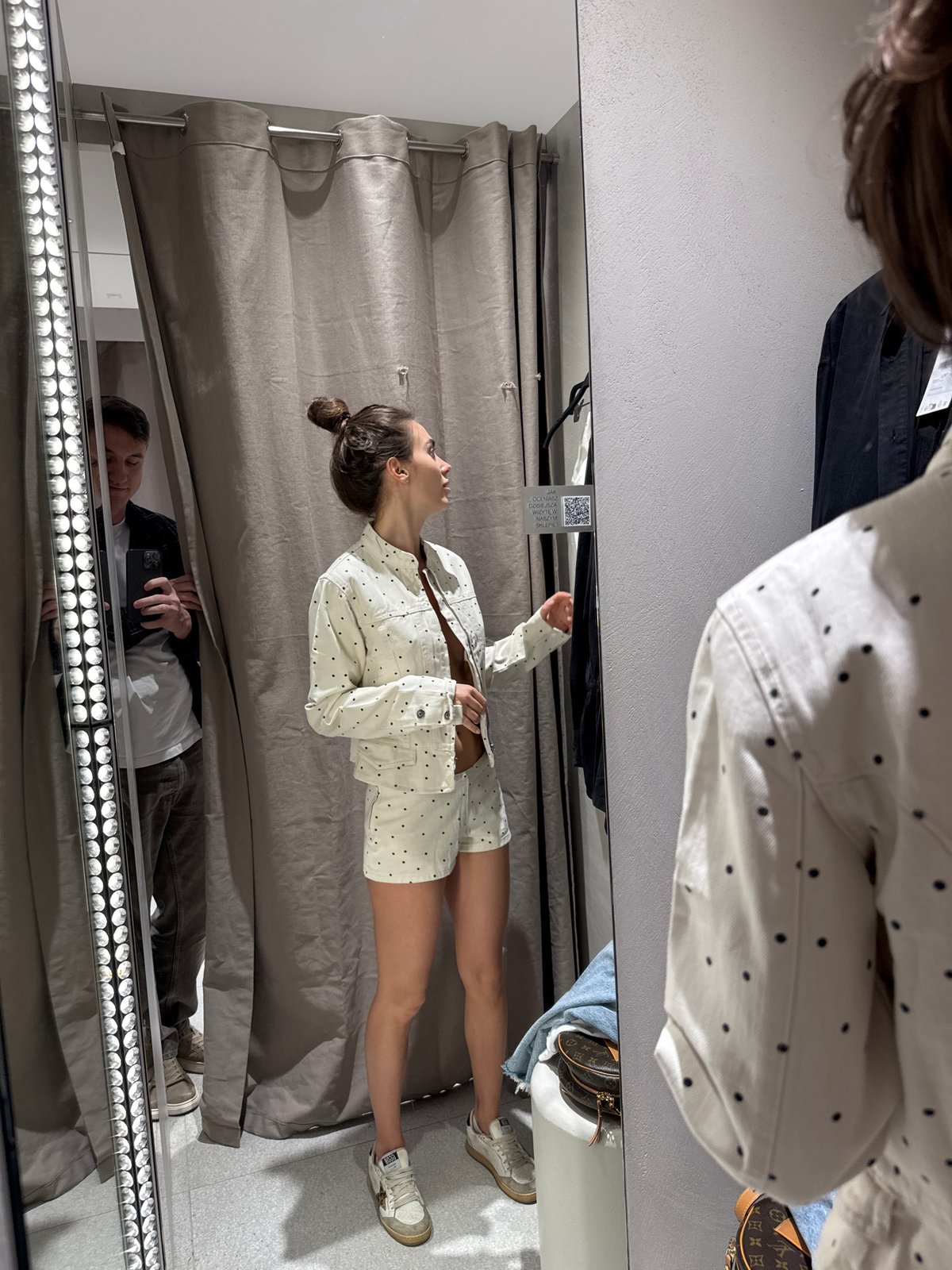 Routine clothing store shopping activity documented across fitting rooms