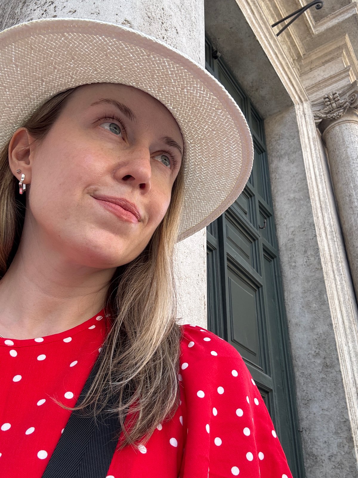 Selfie and candid moment in Rome, red polka dots and straw hat